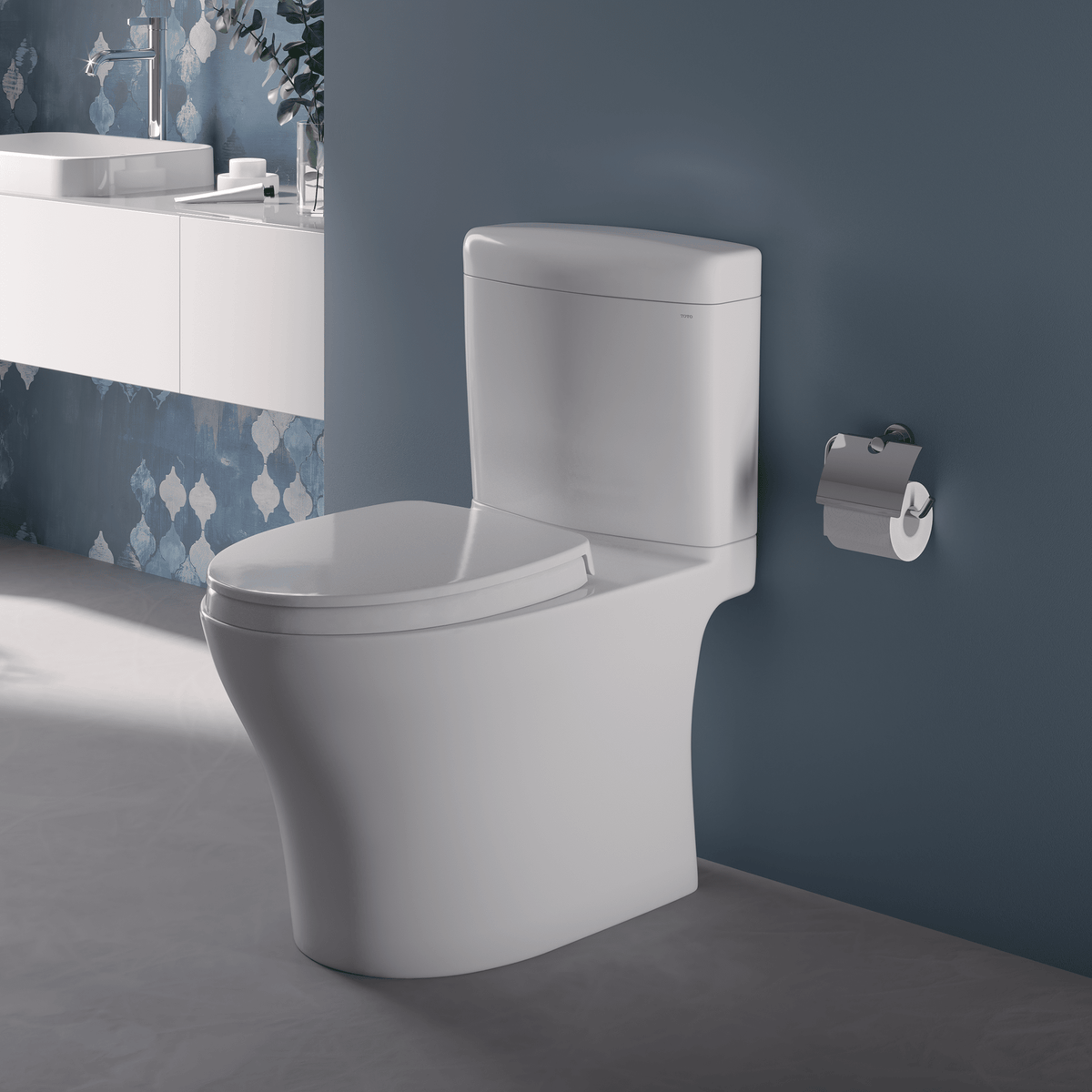 TOTO® Aquia IV® Cube Two-Piece Elongated Dual Flush 1.28 and 0.9 gpf Universal Height Toilet with CeFIONtect® – Elongated – Cotton White –